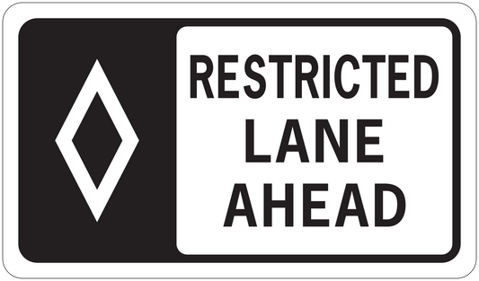 Road sign sticker with black background, white diamond logo and text RESTRICTED LANE AHEAD