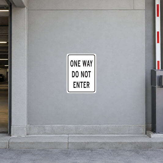 White road sign sticker with black border reading ONE WAY, DO NOT ENTER