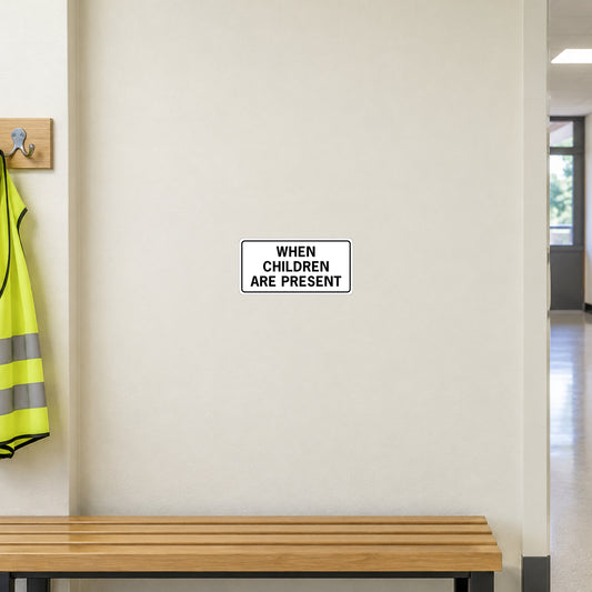 Road sign warning sticker with text “WHEN CHILDREN ARE PRESENT”