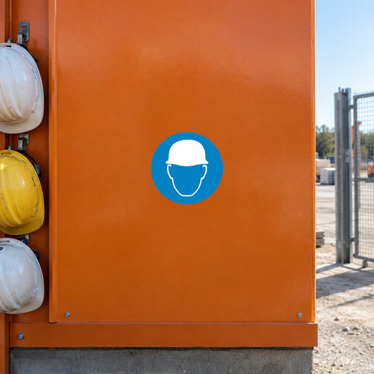 Safety sign sticker with blue face mask/helmet icon on orange surface