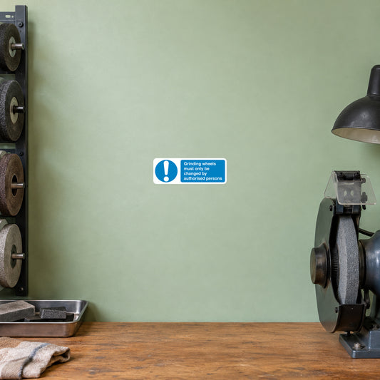 Blue and white grinding safety sign sticker with exclamation mark and warning text