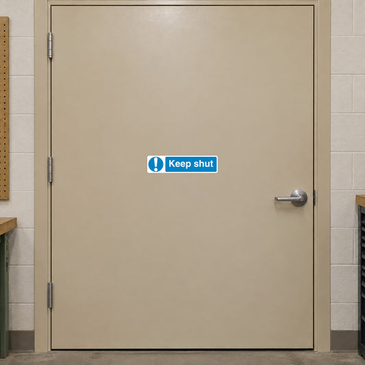 Blue safety sign sticker with exclamation icon and text 'Keep shut'