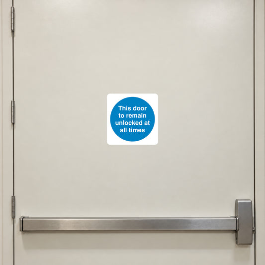 Safety Sign Sticker applied in a smooth cream flat face of a closed emergency access door in an office, push hardware entirely far right and frame far left