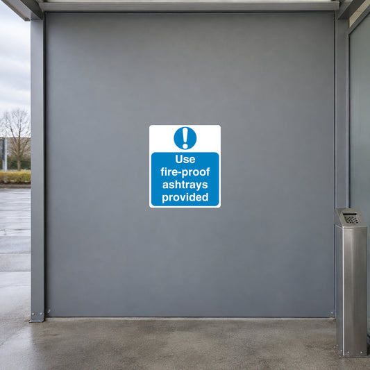 Safety sign sticker with blue 'Use fire-proof ashtrays provided' text