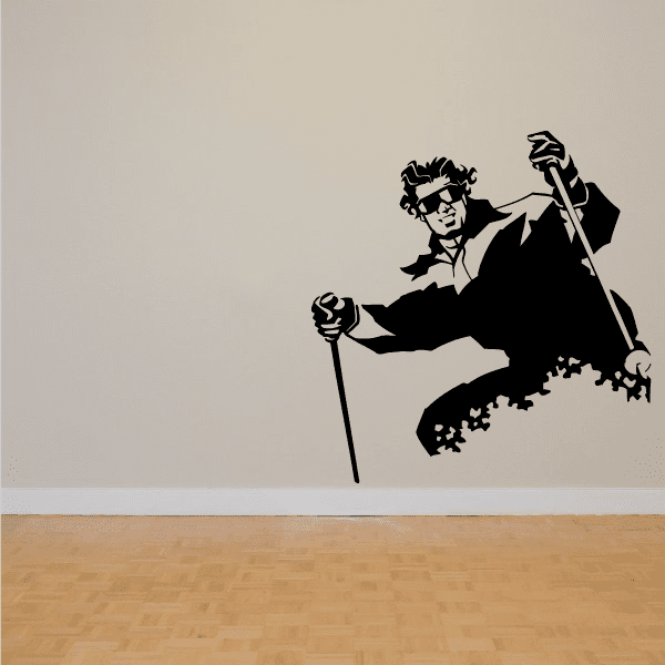 Skiing wall decal vinyl sticker with black skier silhouette holding poles