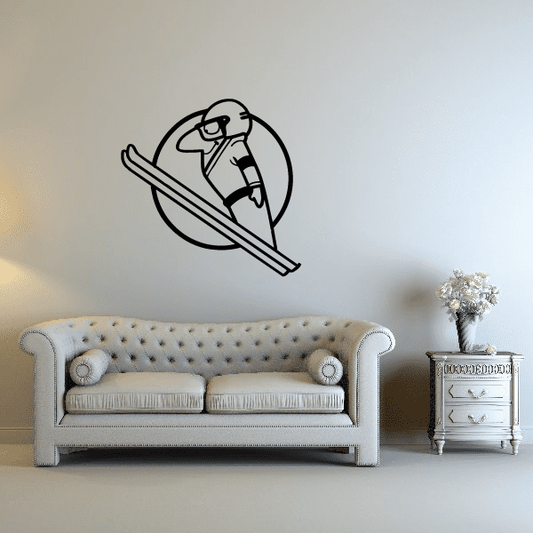 Skiing wall decal vinyl sticker showing skier icon, black outline on light wall.
