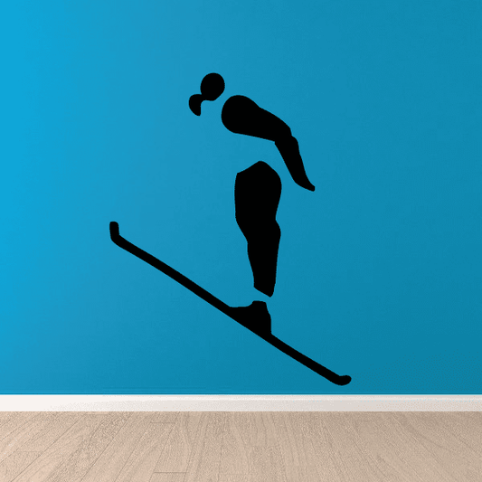 Skiing wall decal vinyl sticker with black skier silhouette on skis