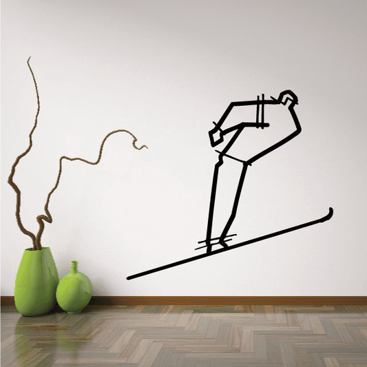 Vinyl skiing wall decal with black skier figure and long skis, single silhouette design.