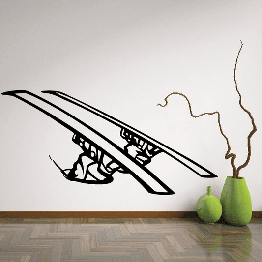 Black skiing wall vinyl decal with skier and skis graphic