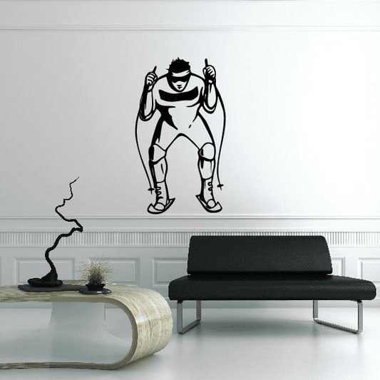 Skiing wall decal vinyl sticker of a black cartoon skier with skis and goggles