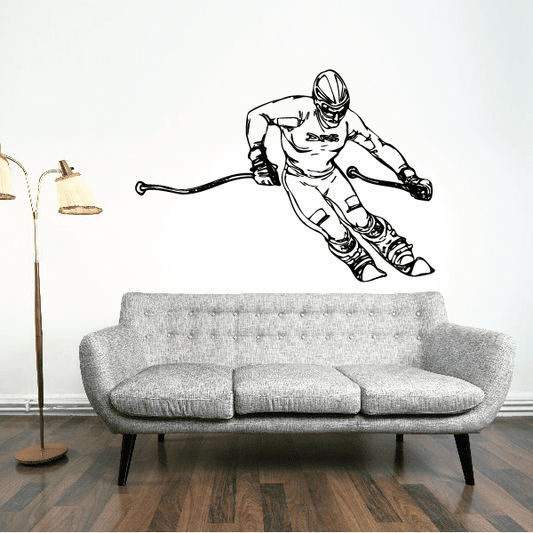 Skiing wall vinyl decal featuring a black outline skier in mid-slide