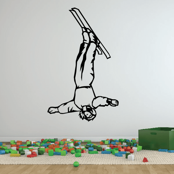 Skiing vinyl wall decal of a skier in mid-motion, black-and-white line art with skis