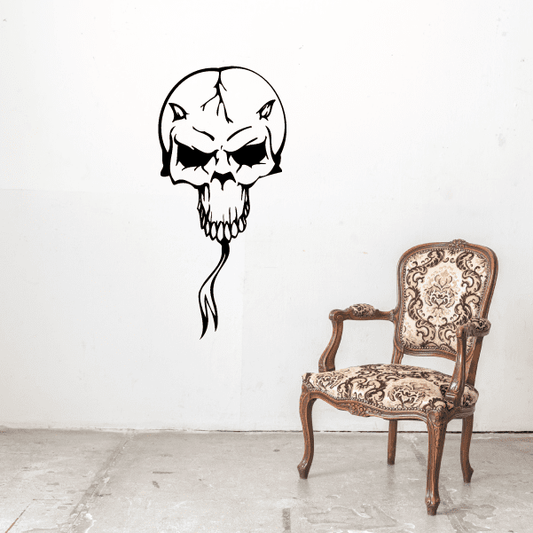Black skull vinyl wall decal with dangling hair design