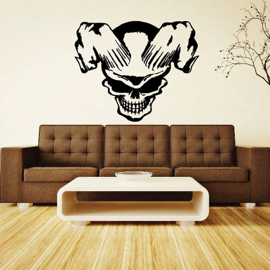 Black skull vinyl wall decal sticker with bold outline, tongue and teeth details