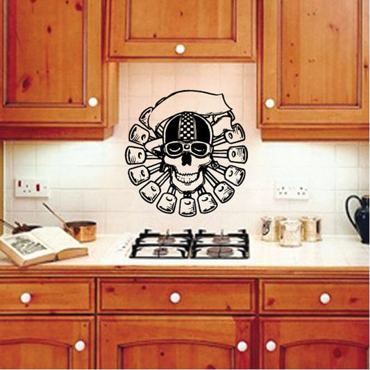 Black and white skull vinyl wall decal with goggles and rifles, round badge style