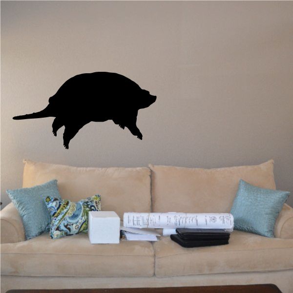 Black snapping turtle wall decal with open mouth and long tail