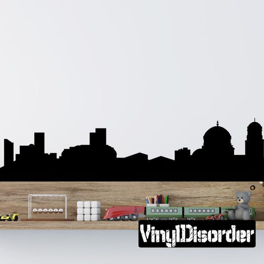 Skyline decal with black city silhouette and white text banner