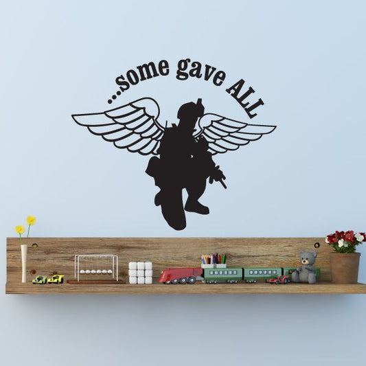 Winged soldier wall decal with black silhouette, wings, and curved “Some gave All” text