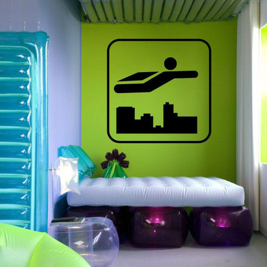 Square sign decal with black hero icon and city skyline graphic