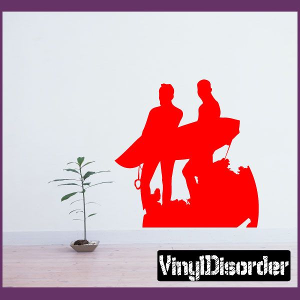 Red surfing wall decal with two surfer silhouettes on a surfboard