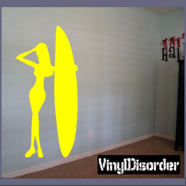 Yellow surfing wall decal: surfer silhouette with surfboard