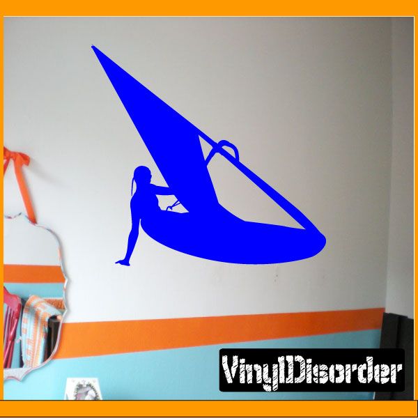Blue surfing wall decal: surfer with surfboard silhouette on vinyl