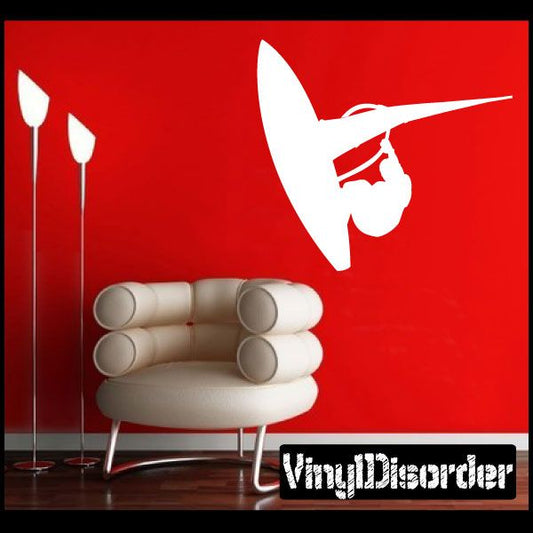 White surfing vinyl wall decal with surfer silhouette on surfboard.