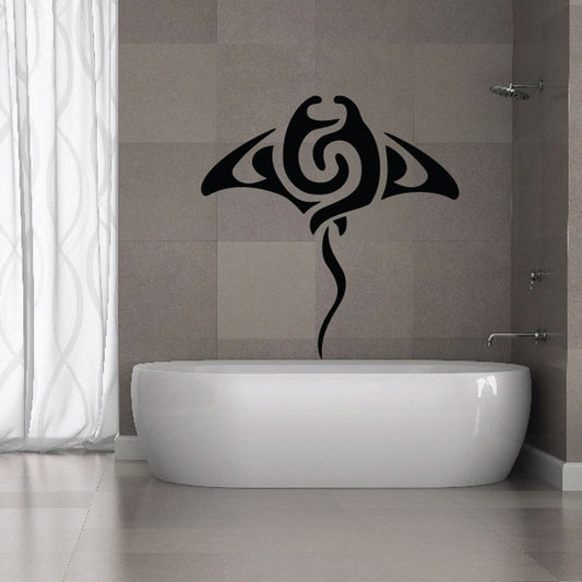 Black swirl stingray body decal on bathroom wall above white bathtub