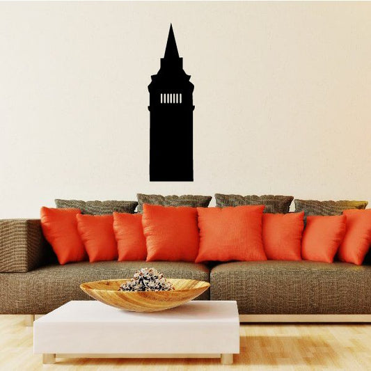 Black tall building wall decal silhouette above sofa