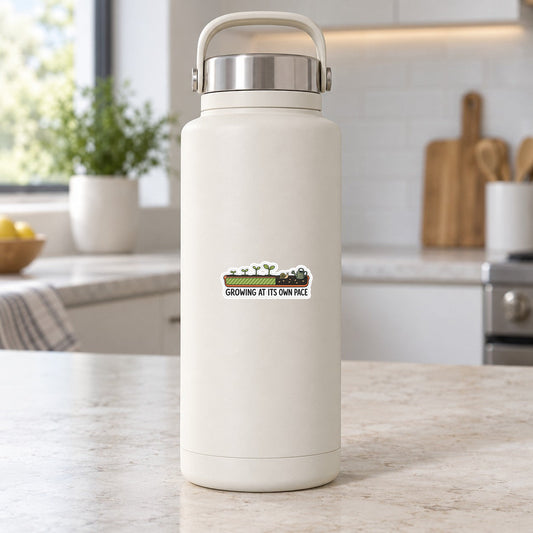 Garden progress sticker on white bottle, with plant graphic and slogan