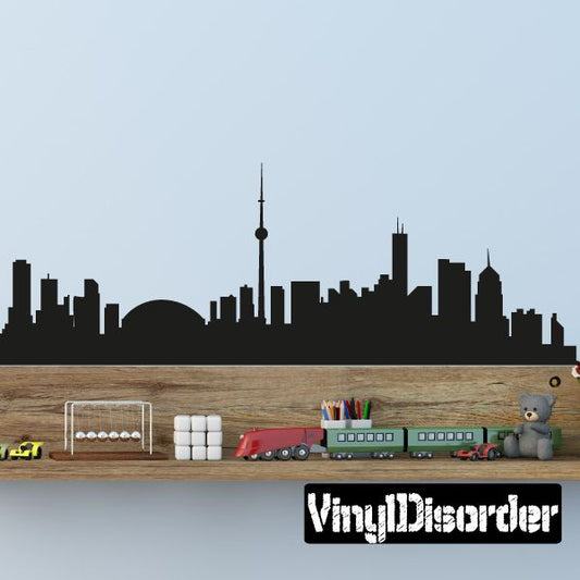 Toronto skyline vinyl wall decal with CN Tower silhouette and small vehicles