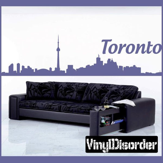 Toronto skyline text decal with purple city silhouette and skyline lettering on wall