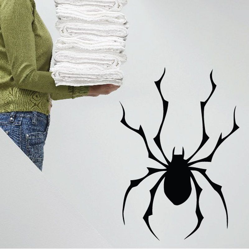 Black spider wall decal with eight long legs and round body