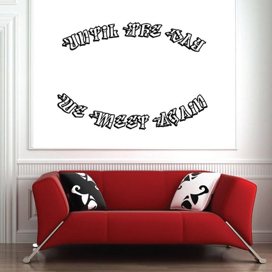 Memorial text wall decal with stylized lettering on light wall