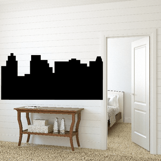 Black urban city skyline decal with tall building silhouettes, horizontal wide
