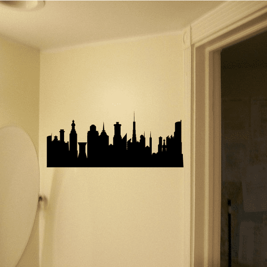Black city skyline wall decal with tall spires and layered building silhouettes