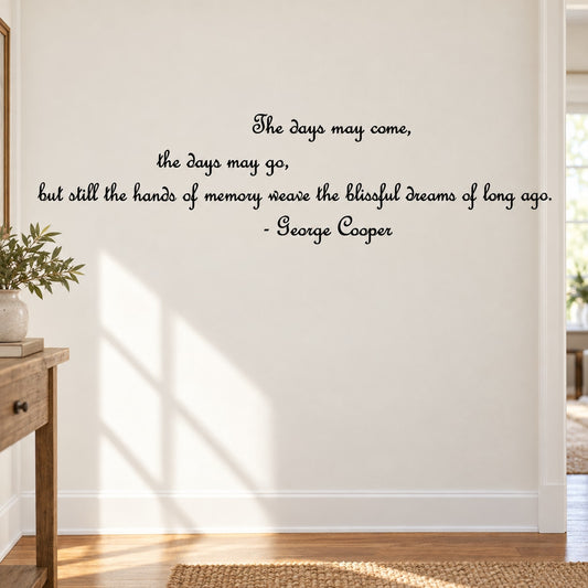Wall decal with centered quote text in black script, signed George Cooper.
