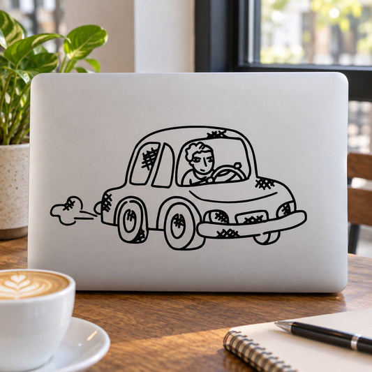 Cartoon decal set featuring a black outline cartoon car with driver on a white laptop lid