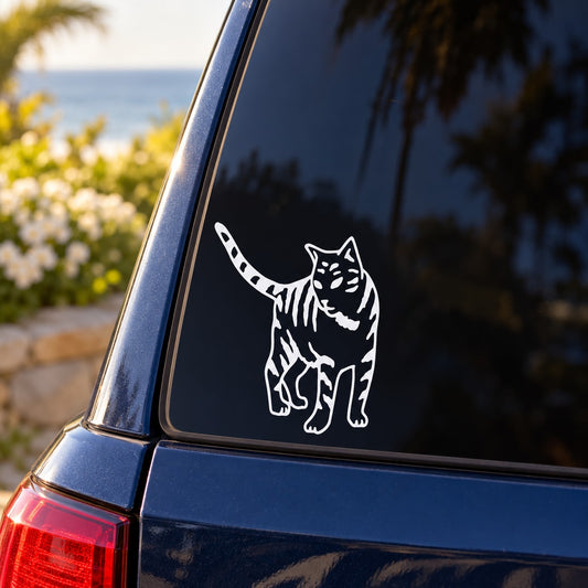 White tabby cat outline decal on dark car window