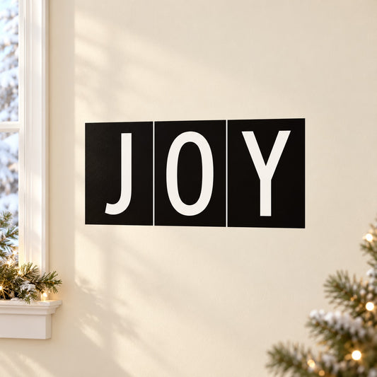 Joy tiles quote decal with bold white "JOY" on black square tiles