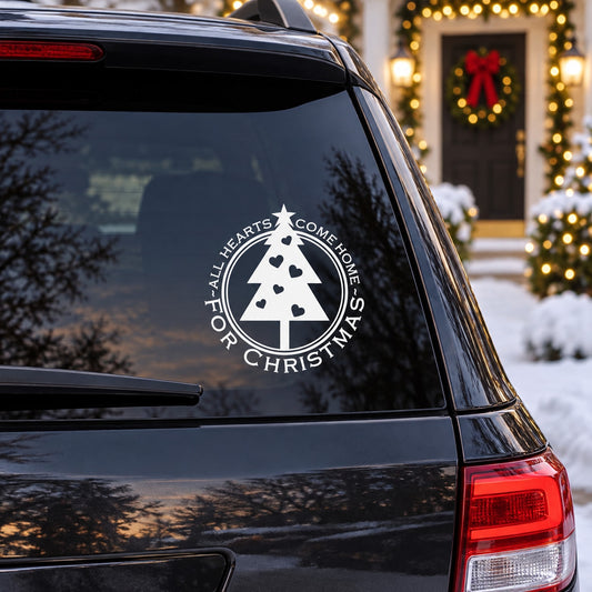 Circular Christmas quote decal with tree and hearts, reads 'All hearts come home'.