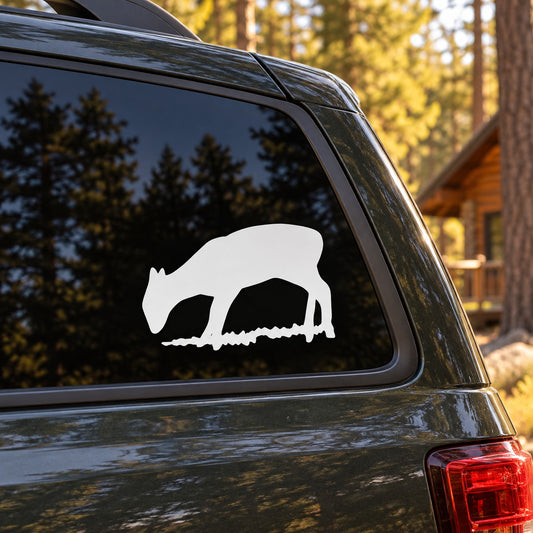 White deer fawn sniffing decal on car side window glass