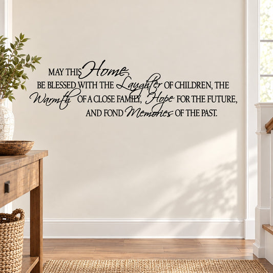 White wall decal with cursive quote about home, children laughter, family warmth