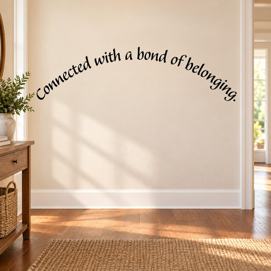 Wall decal quote: "Connected with a bond of belonging" in dark lettering
