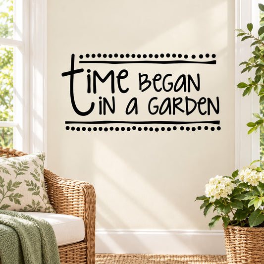 Black garden wall decal with dotted border and script quote: “Time began in a garden”