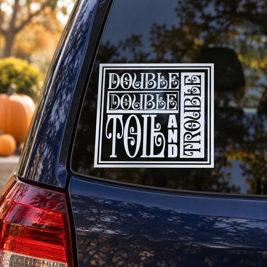 White square Halloween quote decal with ornate lettering on car window