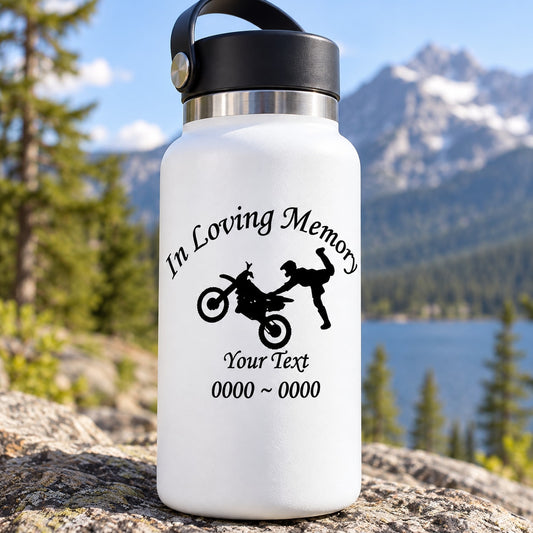 White bottle with In Loving Memory decal and dirt bike rider silhouettes