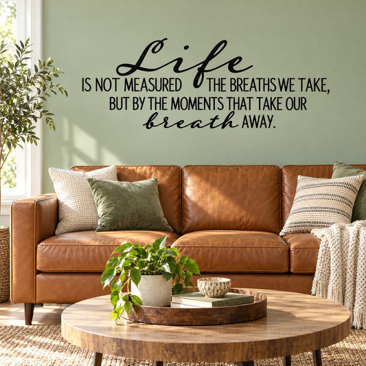 Wall decal with black quote text: Is not measured... breath away.