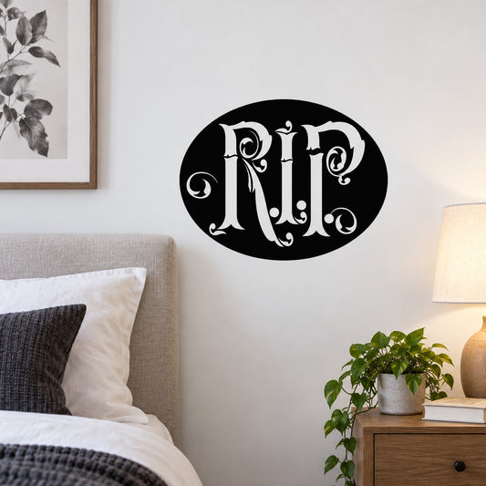 Black oval wall decal with ornate white RIP lettering