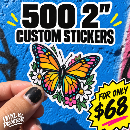 2-inch custom vinyl sticker of a colorful butterfly, held by a finger
